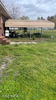 1817 Cobb Rd, Kinston, NC 28501 - view of parking / parking lot featuring a detached carport