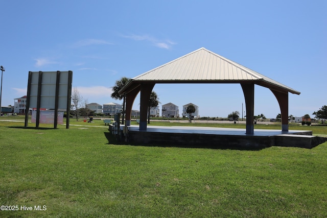 view of community with a gazebo and a yard