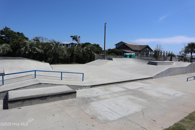 view of pool featuring fence