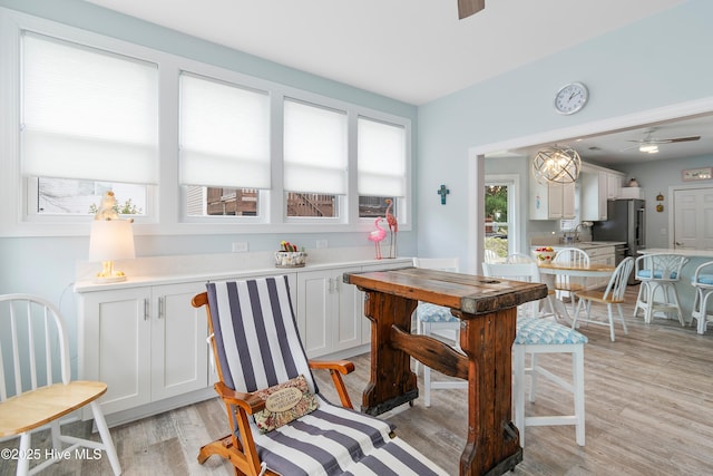 2403 W Oak Island Dr, Oak Island, NC 28465 - dining space with a ceiling fan, dark wood-style flooring, baseboards, and recessed lighting