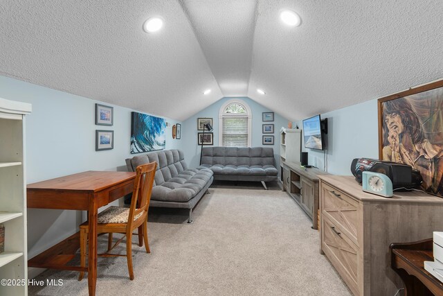 2403 W Oak Island Dr, Oak Island, NC 28465 - living area with a textured ceiling, lofted ceiling, and light carpet