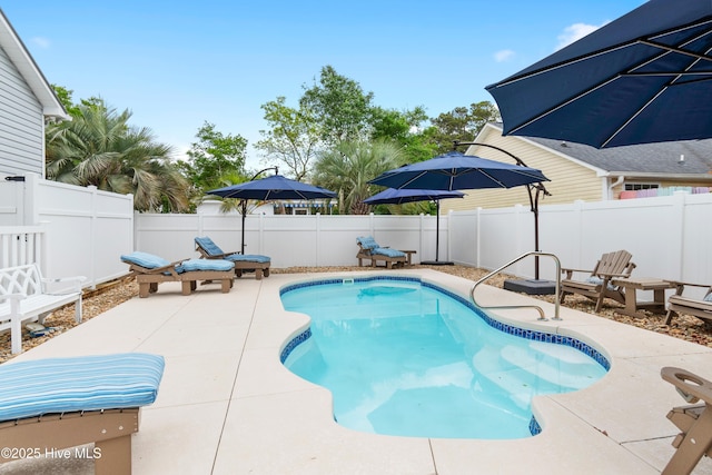 2403 W Oak Island Dr, Oak Island, NC 28465 - garage featuring a garage door opener and freestanding refrigerator