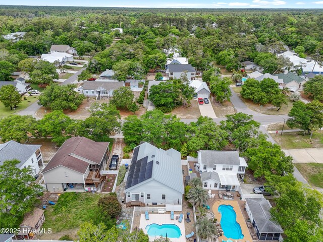 2403 W Oak Island Dr, Oak Island, NC 28465 - aerial perspective of suburban area featuring a pool