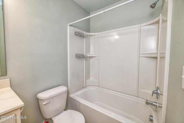 bathroom with vanity,  shower combination, and toilet