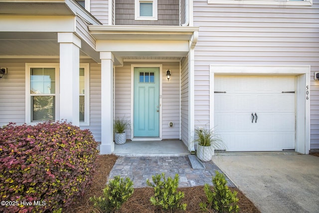 entrance to property with a garage