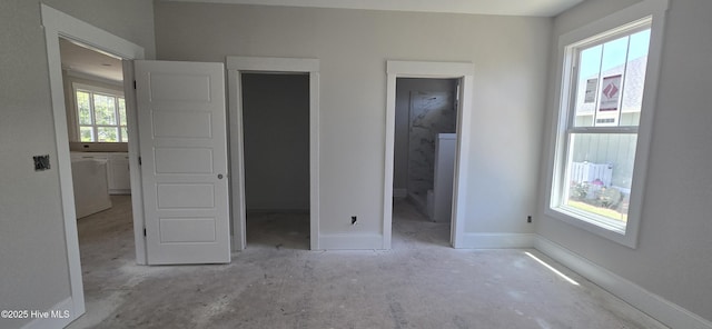 1649 Butterfly Knot Dr SW, Ocean Isle Beach, NC 28469 - unfurnished bedroom featuring baseboards