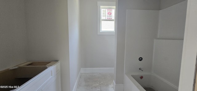 1649 Butterfly Knot Dr SW, Ocean Isle Beach, NC 28469 - bathroom with baseboards and shower / bathing tub combination
