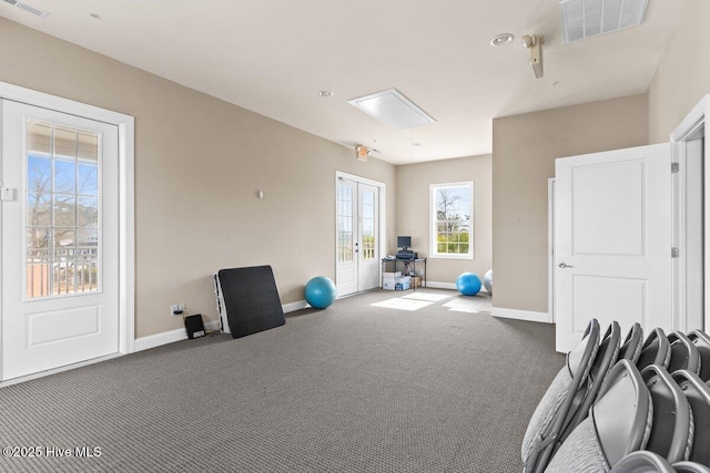 1649 Butterfly Knot Dr SW, Ocean Isle Beach, NC 28469 - workout area featuring carpet, visible vents, french doors, and baseboards