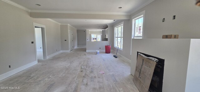1649 Butterfly Knot Dr SW, Ocean Isle Beach, NC 28469 - unfurnished living room featuring a fireplace, baseboards, and ornamental molding