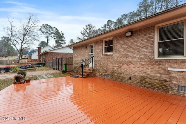 deck featuring fence and entry steps