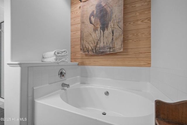 bathroom featuring a garden tub