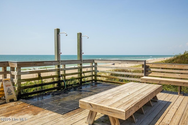 wooden terrace with a water view