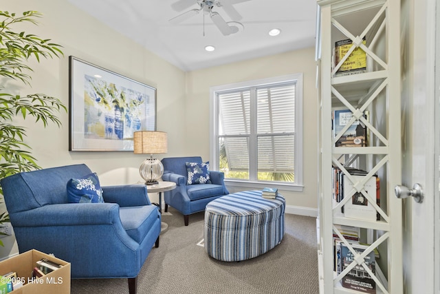 sitting room with carpet floors, a ceiling fan, baseboards, and recessed lighting