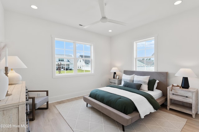 316 Lightning Bug Ln, Holly Ridge, NC 28445 - bedroom featuring ceiling fan, light wood finished floors, recessed lighting, baseboards, and visible vents