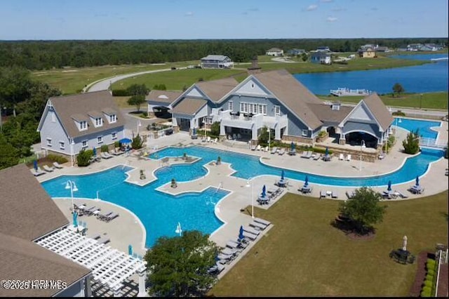 316 Lightning Bug Ln, Holly Ridge, NC 28445 - community pool featuring a water view