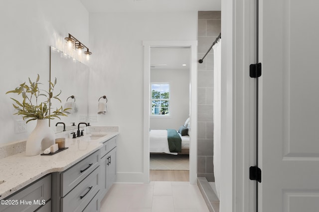 316 Lightning Bug Ln, Holly Ridge, NC 28445 - full bathroom featuring baseboards, a tile shower, tile patterned flooring, and vanity