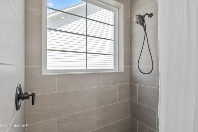 316 Lightning Bug Ln, Holly Ridge, NC 28445 - full bathroom featuring a tile shower and a wealth of natural light