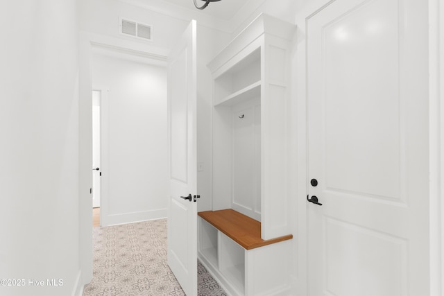 316 Lightning Bug Ln, Holly Ridge, NC 28445 - mudroom featuring visible vents and baseboards