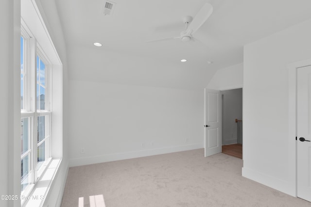 316 Lightning Bug Ln, Holly Ridge, NC 28445 - empty room with baseboards, ceiling fan, light carpet, and a wealth of natural light