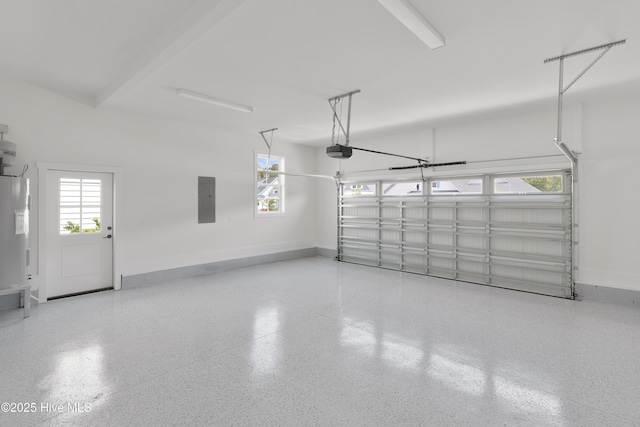 316 Lightning Bug Ln, Holly Ridge, NC 28445 - garage with baseboards, a garage door opener, and electric panel