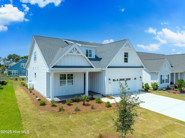 316 Lightning Bug Ln, Holly Ridge, NC 28445 - modern inspired farmhouse featuring board and batten siding, a porch, driveway, and roof with shingles