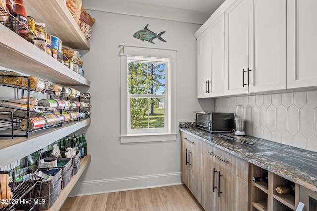 storage area featuring a toaster