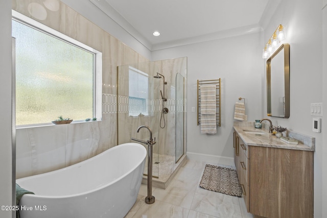full bath featuring vanity, marble finish floor, recessed lighting, a soaking tub, and a stall shower