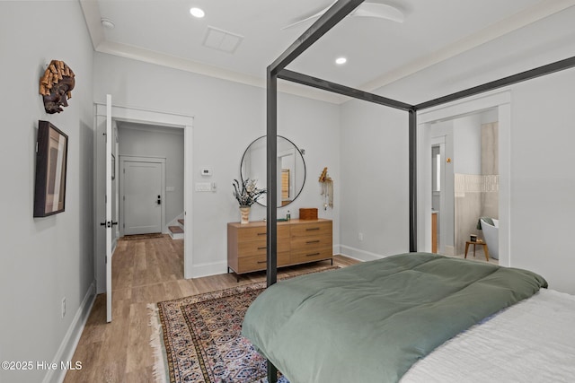 bedroom with light wood-style floors, baseboards, recessed lighting, and visible vents