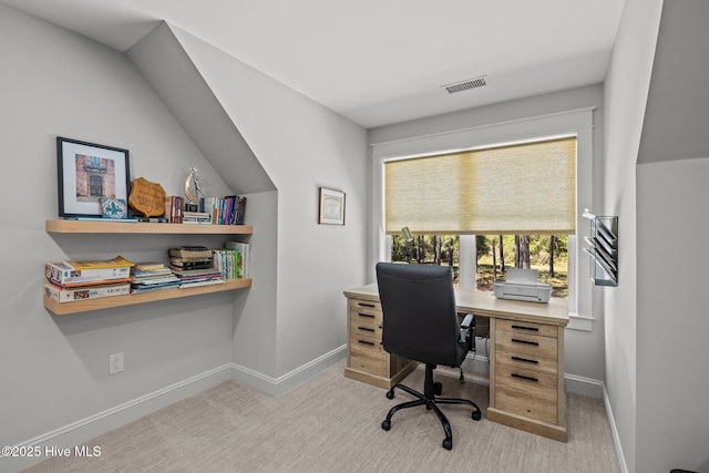 carpeted home office with baseboards and visible vents