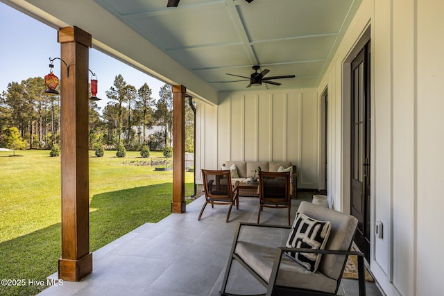 view of patio with an outdoor hangout area and a ceiling fan