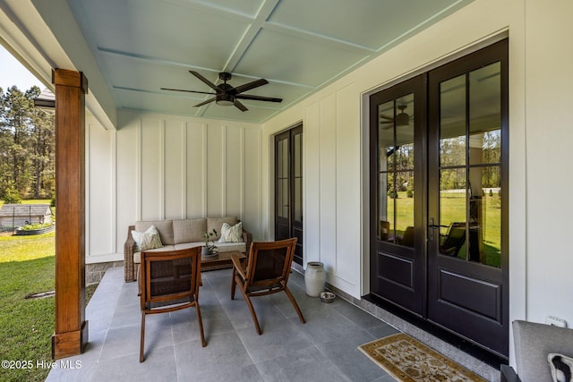 view of patio with french doors, ceiling fan, and outdoor lounge area