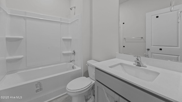 full bath with vanity, bathtub / shower combination, and toilet