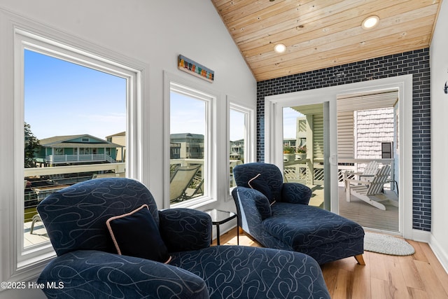 408 Dolphin St, Sunset Beach, NC 28468 - living area with wood ceiling, wood finished floors, baseboards, lofted ceiling, and recessed lighting