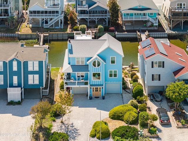 408 Dolphin St, Sunset Beach, NC 28468 - bird's eye view with a water view and a residential view