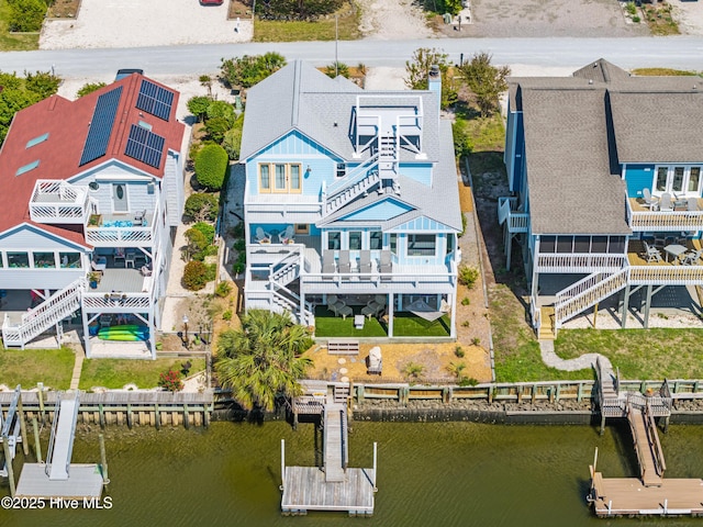 408 Dolphin St, Sunset Beach, NC 28468 - drone / aerial view featuring a water view