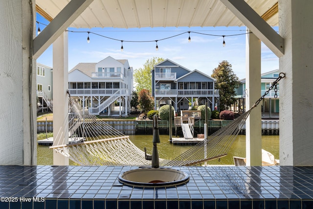 408 Dolphin St, Sunset Beach, NC 28468 - dock area featuring a water view