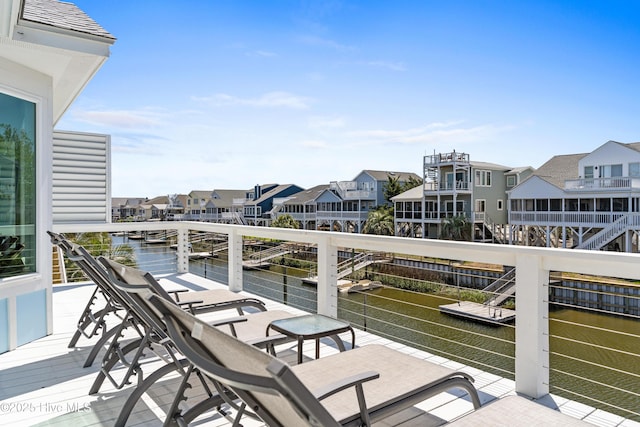 408 Dolphin St, Sunset Beach, NC 28468 - exterior space with a water view and a residential view