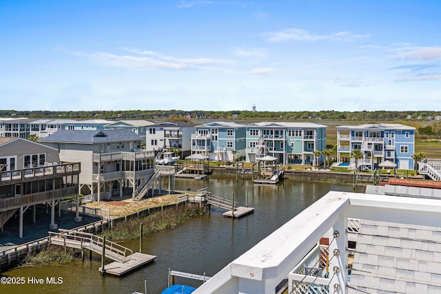 408 Dolphin St, Sunset Beach, NC 28468 - view of dock featuring a water view and a residential view