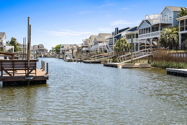 408 Dolphin St, Sunset Beach, NC 28468 - view of dock featuring a residential view and a water view