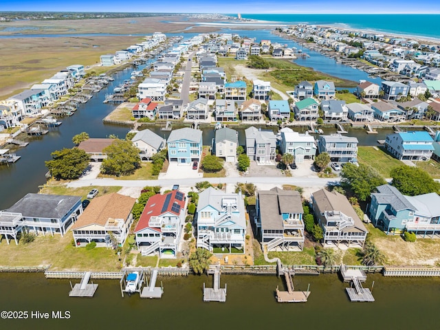 408 Dolphin St, Sunset Beach, NC 28468 - drone / aerial view with a residential view and a water view