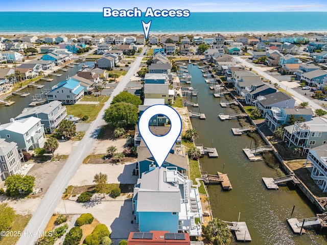 408 Dolphin St, Sunset Beach, NC 28468 - drone / aerial view featuring a water view and a residential view