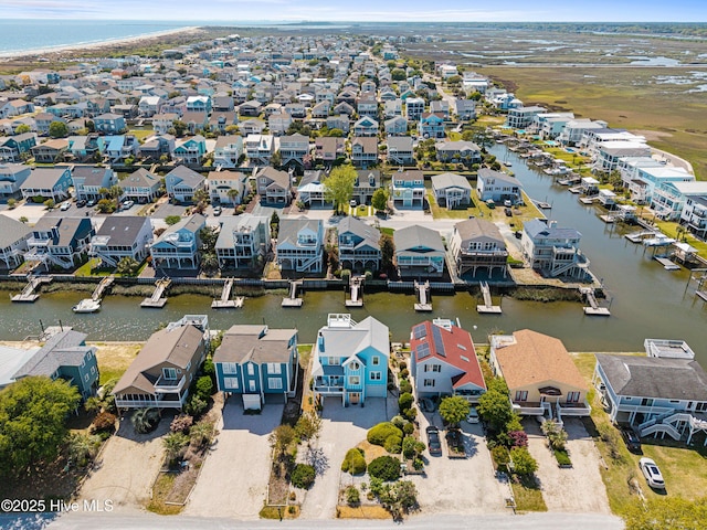 408 Dolphin St, Sunset Beach, NC 28468 - drone / aerial view with a residential view and a water view