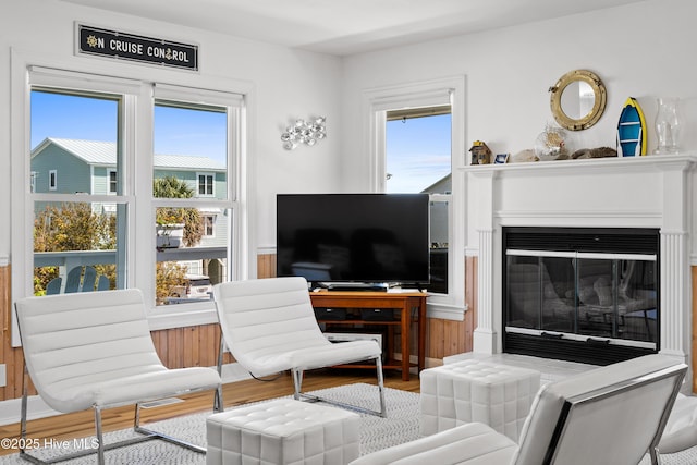 408 Dolphin St, Sunset Beach, NC 28468 - living area with a glass covered fireplace and wood finished floors