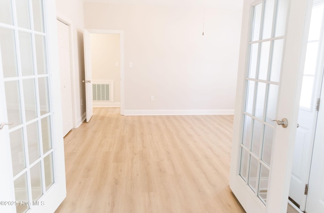 135 Live Oak Dr, Leland, NC 28451 - empty room with baseboards, visible vents, and light wood-type flooring