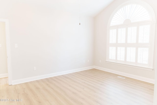 135 Live Oak Dr, Leland, NC 28451 - unfurnished room featuring light wood-type flooring, visible vents, and baseboards