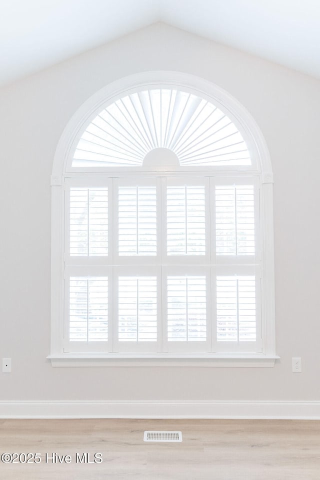 135 Live Oak Dr, Leland, NC 28451 - details with baseboards, visible vents, and wood finished floors