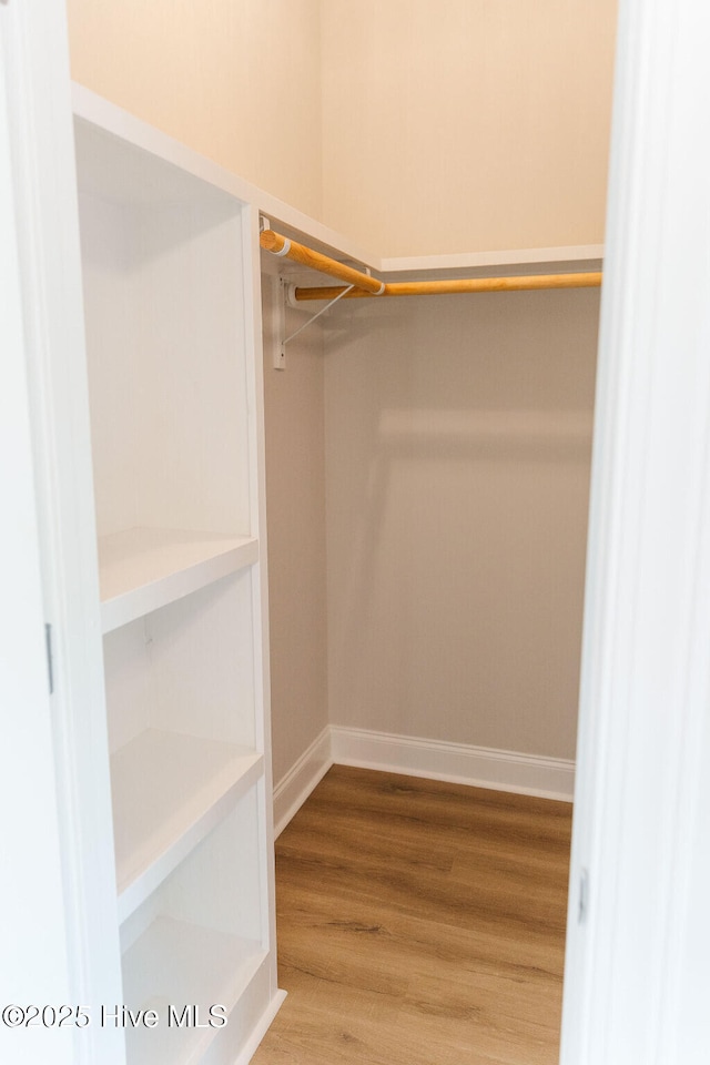 135 Live Oak Dr, Leland, NC 28451 - spacious closet with wood finished floors