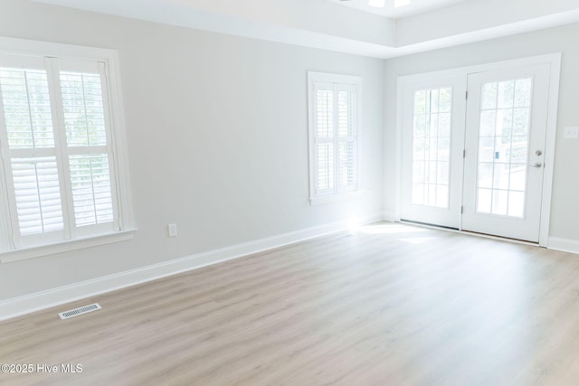 135 Live Oak Dr, Leland, NC 28451 - spare room with baseboards, visible vents, and light wood-style floors