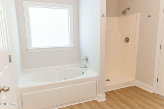 135 Live Oak Dr, Leland, NC 28451 - full bath with walk in shower, a bath, and wood finished floors