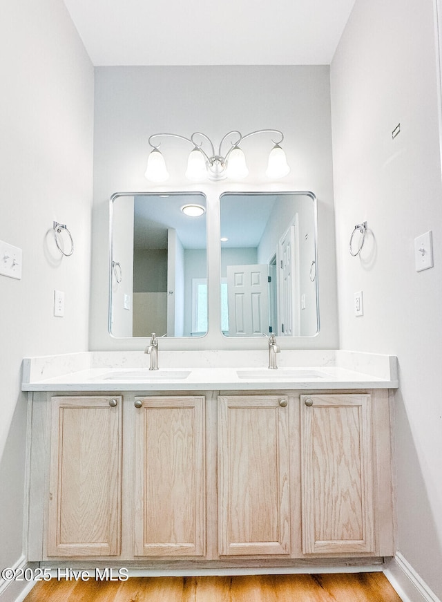 135 Live Oak Dr, Leland, NC 28451 - full bath with baseboards, double vanity, and a sink